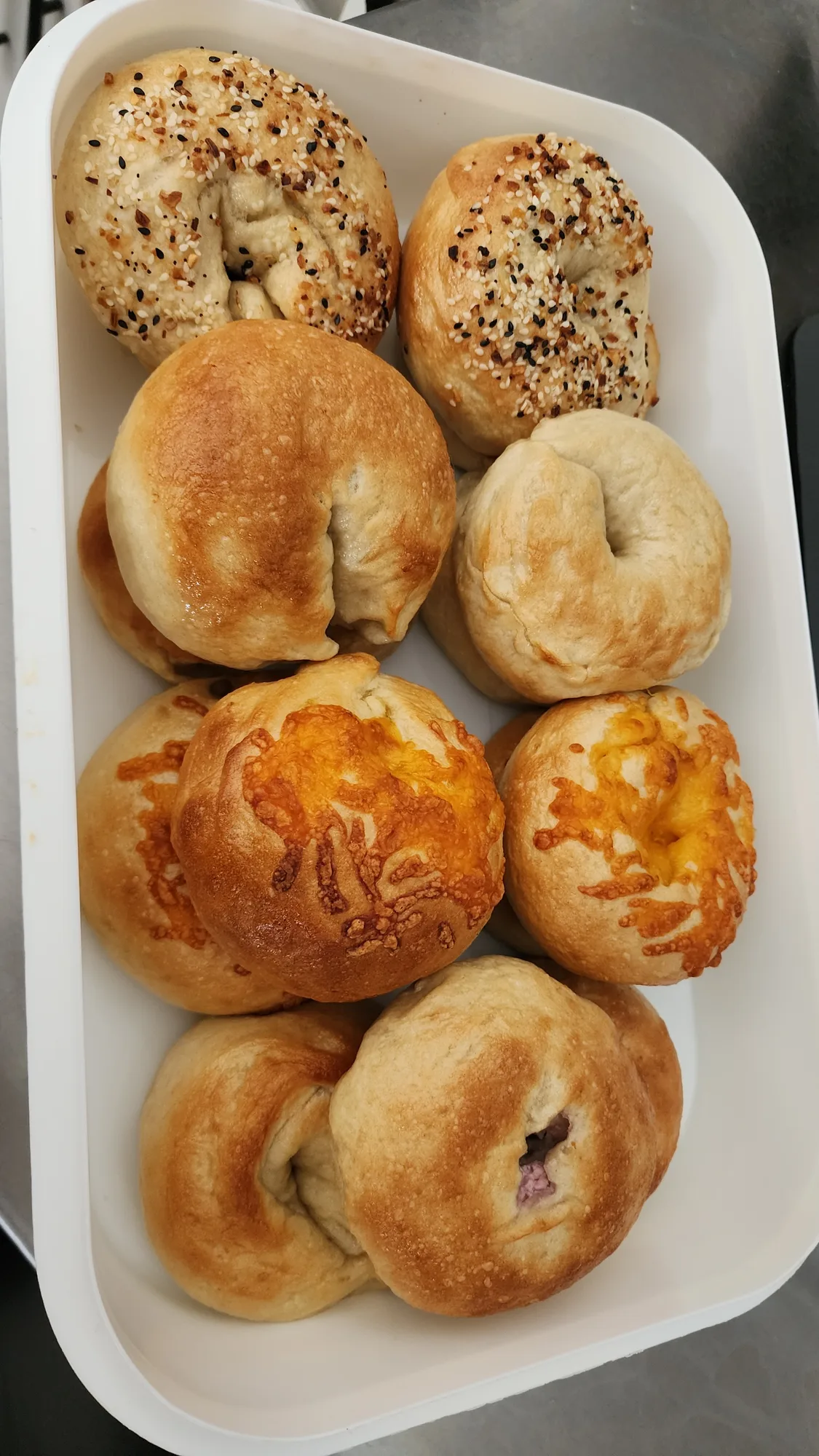 Variety of fresh sourdough bagels from Fit Fuel Cafe